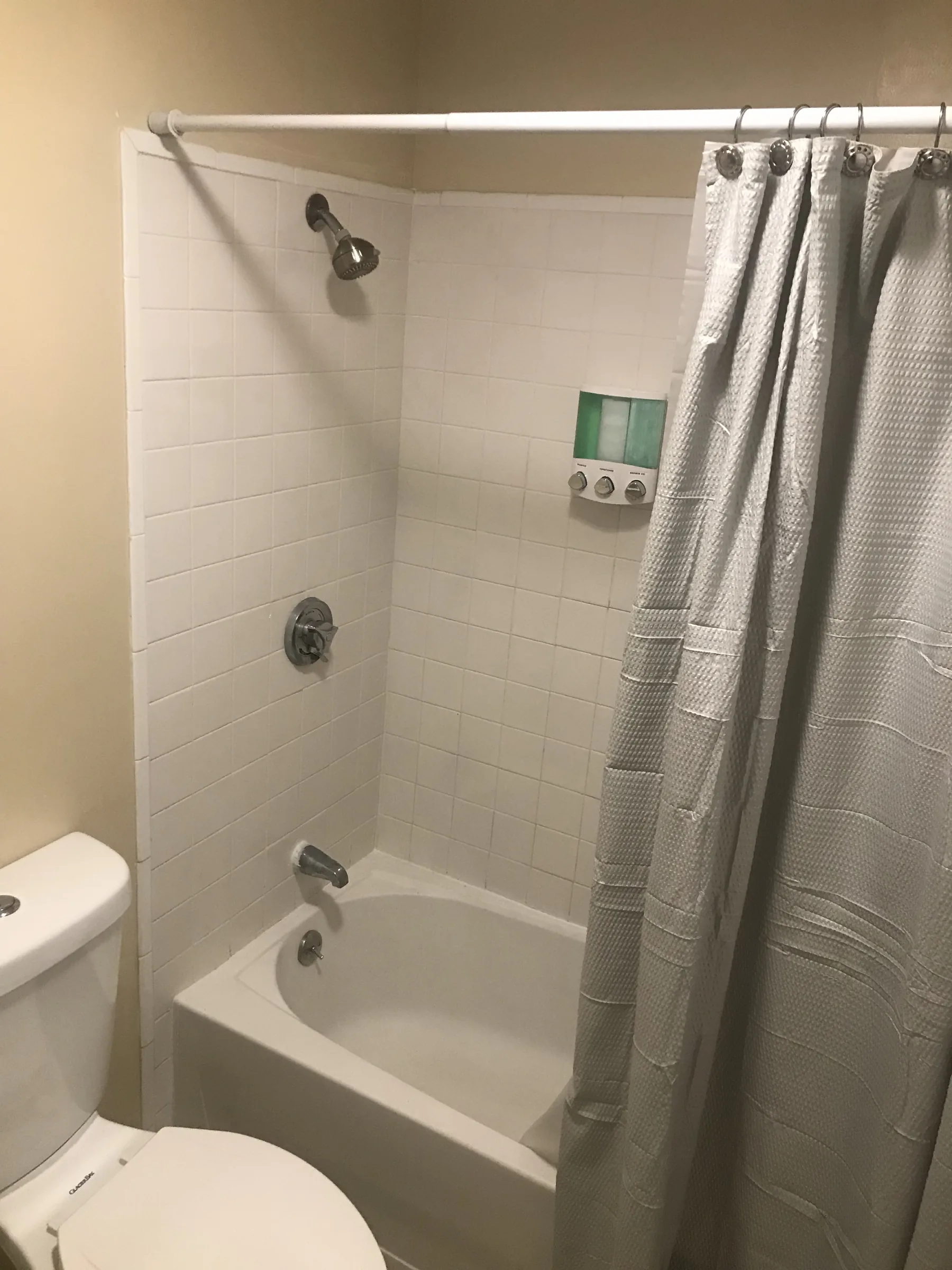 Private bathroom with tub and shower