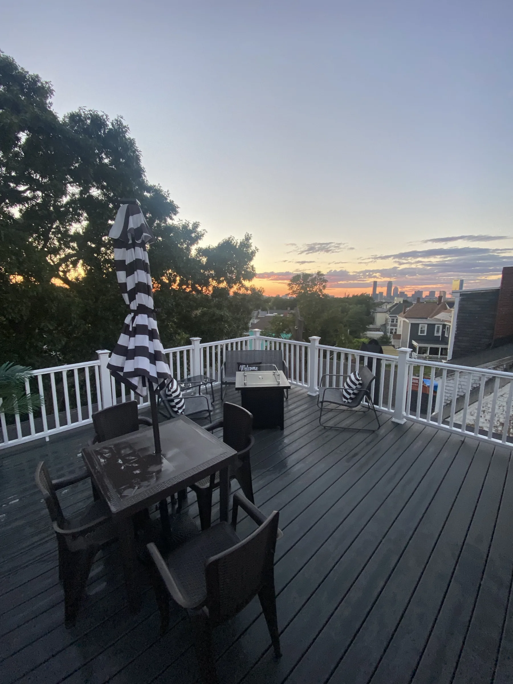 Spacious private deck with Boston skyline views