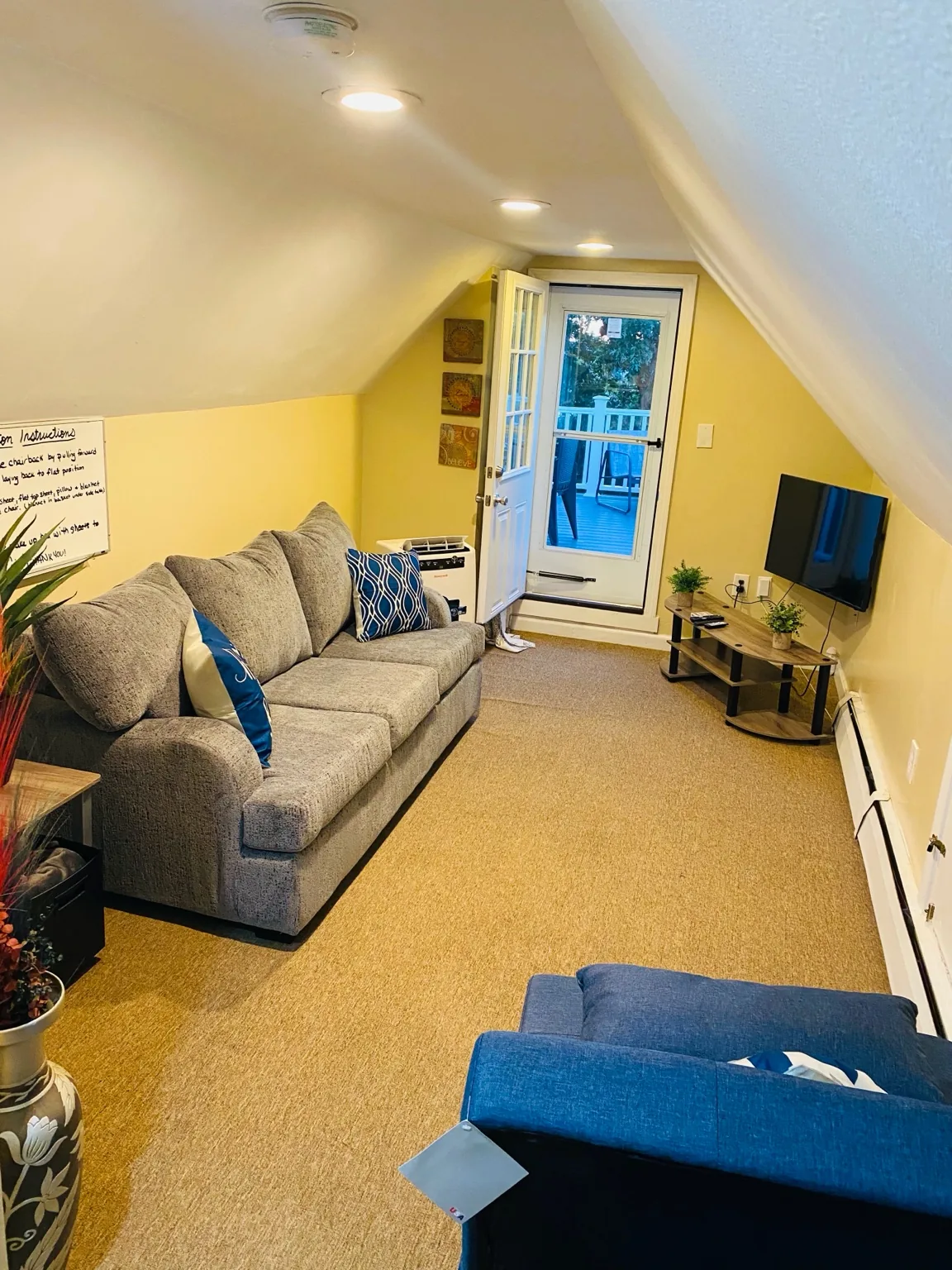 Cozy living room with direct deck access
